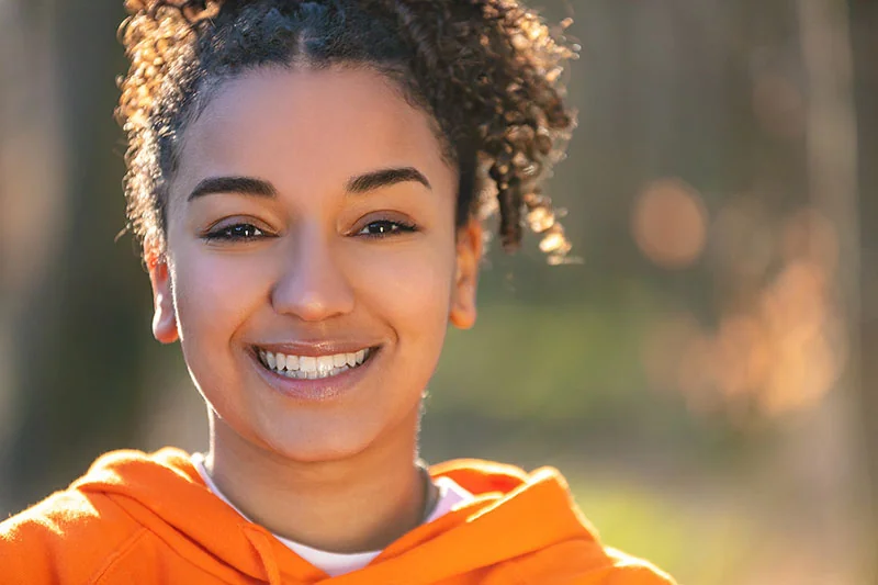 Girl smiling with healthy gums