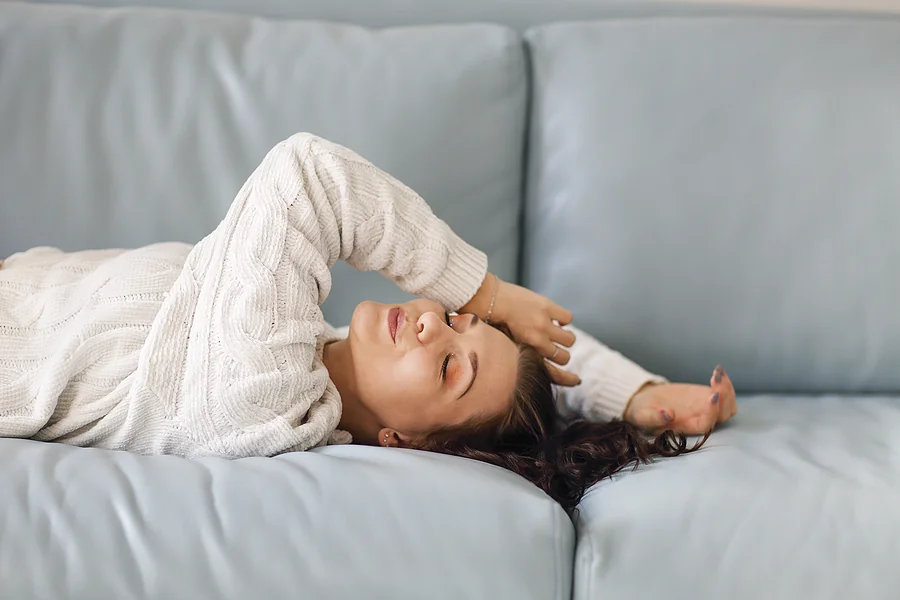 woman relaxing on a couch